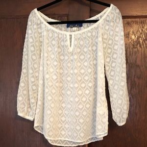 Adorable off the shoulder blouse!